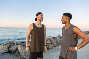 Two young men talking about discomfort linked to hard flaccid syndrome